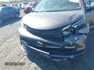 2021 Toyota Sienna LE z VIN 5TDKSKFCXMS031520, wystawiony jako IAAI lot #42080878 z przebiegiem 66 336 mil mil oraz . Historia ofert i sprzedaży dostępna na DreamBid. Obrazek 6.