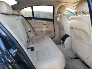 2015 BMW 5 Series 528i xDrive with VIN WBA5A7C58FG143147, listed as a Copart auction lot 52850195 with 130,528 mi miles and Salvage Title. Bid and sale history available at carsss.com. Image 10.