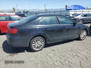 2012 Volkswagen Jetta SEL with VIN 3VWLP7AJ0CM327814, listed as a Copart auction lot 52235685 with 97,705 mi miles and Salvage title. Bid and sale history available at DreamBid. Image 3.