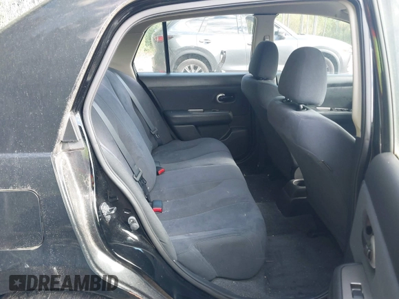 2009 Nissan Versa 1.8 S with VIN 3N1BC11E39L497791, listed as a IAAI auction lot 39679827 with 113,244 mi miles. Bid and sale history available at carsss.com. Image 8.