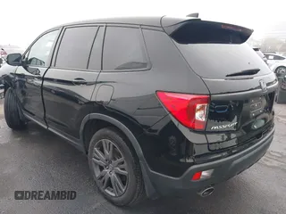 2021 Honda Passport EX-L with VIN 5FNYF7H5XMB013923, listed as a IAAI auction lot 41669295 with 42,969 mi miles. Bid and sale history available at carsss.com. Image 3.