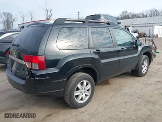 2011 Mitsubishi Endeavor LS with VIN 4A4JN2AS7BE026322, listed as a IAAI auction lot 41709375 with 230,701 mi miles. Bid and sale history available at carsss.com. Image 4.
