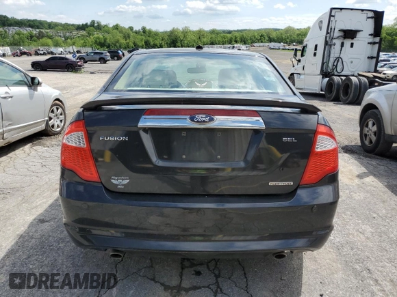 2012 Ford Fusion SEL z VIN 3FAHP0JG4CR388483, wystawiony jako Copart lot #57391805 z przebiegiem 184 665 mil mil oraz Szkoda całkowita • Salvage title. Historia ofert i sprzedaży dostępna na DreamBid. Obrazek 6.