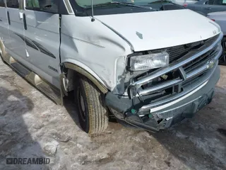 1999 Chevrolet Express Van with VIN 1GBFG15RXX1047502, listed as a IAAI auction lot 41379918 with 101,936 mi miles. Bid and sale history available at carsss.com. Image 6.