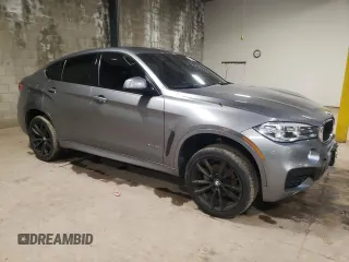 2019 BMW X6 xDrive35i with VIN 5UXKU2C56K0Z65754, listed as a Copart auction lot 82497523 with 53,122 mi miles. Bid and sale history available at carsss.com. Image 4.