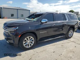 2022 Chevrolet Suburban Premier with VIN 1GNSKFKD4NR139211, listed as a Copart auction lot 61656155 with 61,689 mi miles and Salvage title. Bid and sale history available at DreamBid. Image 1.