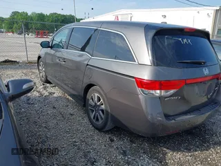 2014 Honda Odyssey Touring with VIN 5FNRL5H99EB111685, listed as a IAAI auction lot 42141227 with 183,484 mi miles and . Bid and sale history available at DreamBid. Image 3.