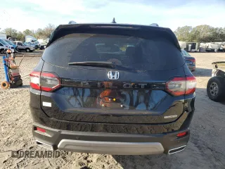 2023 Honda Pilot Touring with VIN 5FNYG2H77PB006594, listed as a Copart auction lot 83662854 with 37,637 mi miles and Salvage Title. Bid and sale history available at DreamBid. Image 6.