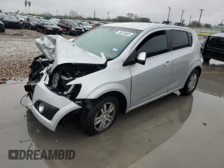 2014 Chevrolet Sonic LT with VIN 1G1JC6SH1E4190045, listed as a Copart auction lot 88254065 with 98,185 mi miles and Salvage Title. Bid and sale history available at carsss.com. Image 1.