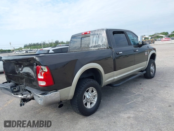 2010 Dodge Ram 2500 SLT with VIN 3D7UT2CL5AG172425, listed as a IAAI auction lot 41792566 with 185,236 mi miles. Bid and sale history available at carsss.com. Image 4.
