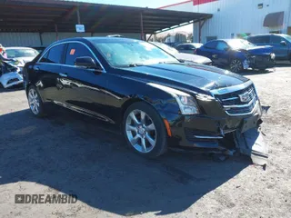 2016 Cadillac ATS Sedan Luxury Collection RWD with VIN 1G6AB5RX7G0134156, listed as a IAAI auction lot 40159597 with 85,101 mi miles. Bid and sale history available at carsss.com. Image 1.