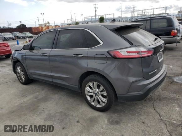 2021 Ford Edge Titanium with VIN 2FMPK4K96MBA16599, listed as a Copart auction lot 53920735 with 71,376 mi miles and Salvage title. Bid and sale history available at DreamBid. Image 2.