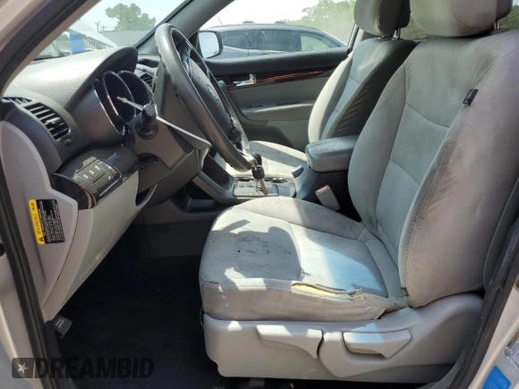2013 Kia Sorento LX with VIN 5XYKT4A20DG323200, listed as a Copart auction lot 61738005 with 205,312 mi miles and Salvage title. Bid and sale history available at DreamBid. Image 7.