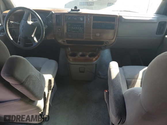2005 Chevrolet Express Cargo Van YF7 Upfitter with VIN 1GBFG15T451209911, listed as a Copart auction lot 77113804 with 165,278 mi miles and Salvage Title. Bid and sale history available at carsss.com. Image 8.