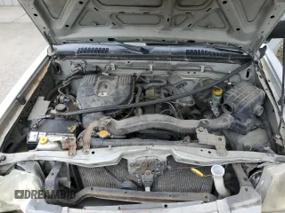 2002 Nissan Frontier z VIN 1N6DD26S02C360894, wystawiony jako Copart lot #54633205 z przebiegiem 239 440 mil mil oraz Szkoda całkowita • Salvage title. Historia ofert i sprzedaży dostępna na DreamBid. Obrazek 11.