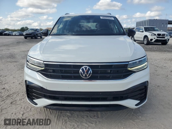 2022 Volkswagen Tiguan SE R-Line Black with VIN 3VVCB7AX1NM080975, listed as a Copart auction lot 56099945 with 42,376 mi miles and Salvage title. Bid and sale history available at DreamBid. Image 5.