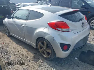 2013 Hyundai Veloster Turbo with VIN KMHTC6AE4DU157798, listed as a IAAI auction lot 42001561 with 163,370 mi miles and . Bid and sale history available at DreamBid. Image 3.