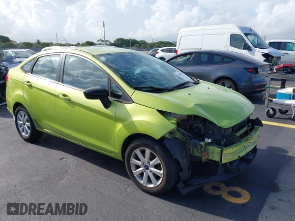 2011 Ford Fiesta SE z VIN 3FADP4BJ3BM181711, wystawiony jako IAAI lot #42492104 z przebiegiem 102 667 mil mil oraz . Historia ofert i sprzedaży dostępna na DreamBid. Obrazek 1.