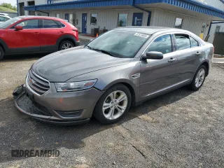 2014 Ford Taurus SEL z VIN 1FAHP2E83EG148057, wystawiony jako Copart lot #57574605 z przebiegiem 177 301 mil mil oraz Nie do naprawy • Non repairable. Historia ofert i sprzedaży dostępna na DreamBid. Obrazek 1.