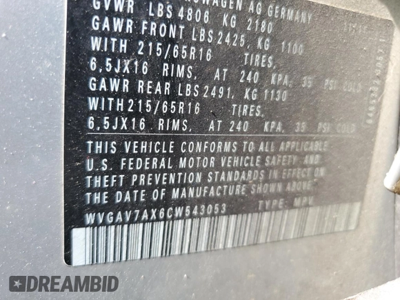 2012 Volkswagen Tiguan SE z VIN WVGAV7AX6CW543053, wystawiony jako Copart lot #53160825 z przebiegiem 167 185 mil mil oraz Szkody całkowita. Historia ofert i sprzedaży dostępna na DreamBid. Obrazek 14.