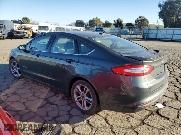 2015 Ford Fusion SE Hybrid with VIN 3FA6P0LU4FR213570, listed as a Copart auction lot 82136224 with 148,524 mi miles and Salvage Title. Bid and sale history available at carsss.com. Image 2.