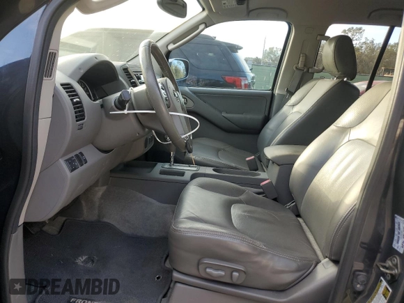 2011 Nissan Frontier SL with VIN 1N6AD0ER2BC432071, listed as a Copart auction lot 81406294 with 114,945 mi miles and Salvage title. Bid and sale history available at DreamBid. Image 7.
