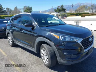 2021 Hyundai Tucson Value z VIN KM8J33A43MU306697, wystawiony jako IAAI lot #41869100 z przebiegiem 129 776 mil mil oraz . Historia ofert i sprzedaży dostępna na DreamBid. Obrazek 1.