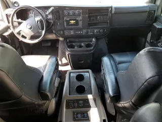 2018 Chevrolet Express Cargo Van with VIN 1GCWGBFG5J1242705, listed as a Copart auction lot 55627615 with 77,611 mi miles and Clean Title. Bid and sale history available at carsss.com. Image 8.