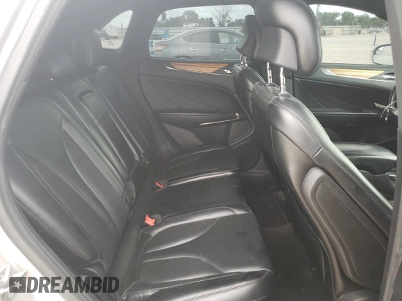 2015 Lincoln MKC z VIN 5LMCJ1A93FUJ15991, wystawiony jako Copart lot #52966915 z przebiegiem 119 140 mil mil oraz Szkoda całkowita • Salvage title. Historia ofert i sprzedaży dostępna na DreamBid. Obrazek 11.