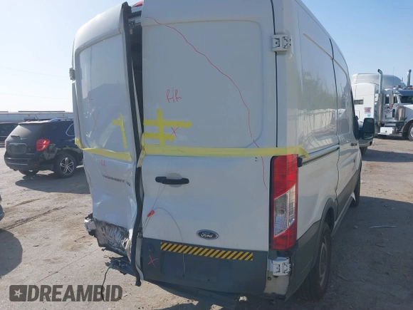2017 Ford Transit Cargo with VIN 1FTYE1CM4HKB25432, listed as a IAAI auction lot 41830840 with 184,829 mi miles and . Bid and sale history available at carsss.com. Image 4.