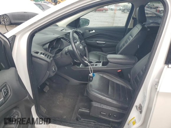 2018 Ford Escape Titanium z VIN 1FMCU9J94JUB49827, wystawiony jako Copart lot #55697385 z przebiegiem 98 682 mil mil oraz Szkoda całkowita • Salvage title. Historia ofert i sprzedaży dostępna na DreamBid. Obrazek 7.