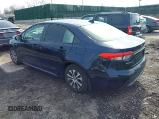 2021 Toyota Corolla Hybrid LE with VIN JTDEAMDE8MJ017192, listed as a IAAI auction lot 41669538 with 45,746 mi miles. Bid and sale history available at carsss.com. Image 3.
