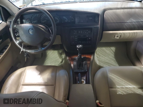 2000 Cadillac Catera z VIN W06VR54R7YR124650, wystawiony jako Copart lot #49602314 z przebiegiem 77 800 mil mil oraz Nie do naprawy • Non repairable. Historia ofert i sprzedaży dostępna na DreamBid. Obrazek 8.