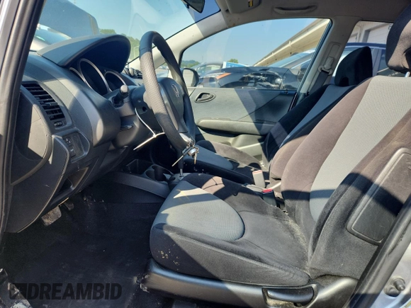2007 Honda Fit with VIN JHMGD38407S066833, listed as a Copart auction lot 61713125 with 62,917 mi miles and Salvage title. Bid and sale history available at DreamBid. Image 7.