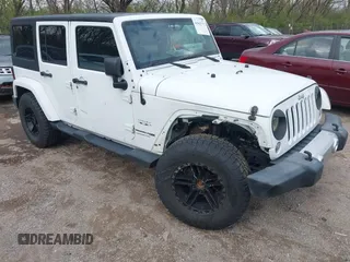 2018 Jeep Wrangler Unlimited Sahara z VIN 1C4BJWEG8JL937483, wystawiony jako IAAI lot #41962772 z przebiegiem 110 648 mil mil oraz . Historia ofert i sprzedaży dostępna na DreamBid. Obrazek 1.