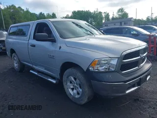 2015 Ram 1500 Tradesman with VIN 3C6JR7DGXFG631473, listed as a IAAI auction lot 42258733 with Not provided miles and . Bid and sale history available at DreamBid. Image 1.