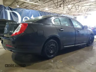 2014 Lincoln MKS z VIN 1LNHL9DK7EG610823, wystawiony jako Copart lot #47544585 z przebiegiem 131 176 mil mil oraz Czysty tytuł • Clean title. Historia ofert i sprzedaży dostępna na DreamBid. Obrazek 3.