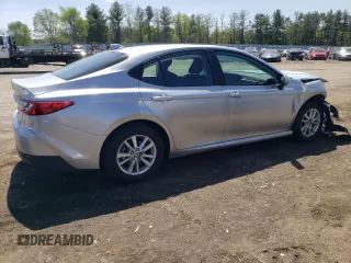 2025 Toyota Camry LE z VIN 4T1DBADK2SU525291, wystawiony jako Copart lot #54872725 z przebiegiem 5 855 mil mil oraz Szkoda całkowita • Salvage title. Historia ofert i sprzedaży dostępna na DreamBid. Obrazek 3.