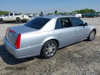 2006 Cadillac DTS 1SD z VIN 1G6KD57Y86U110272, wystawiony jako IAAI lot #42059673 z przebiegiem 147 610 mil mil oraz . Historia ofert i sprzedaży dostępna na DreamBid. Obrazek 4.