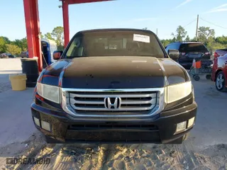 2012 Honda Ridgeline RTL with VIN 5FPYK1F51CB452400, listed as a IAAI auction lot 41853497 with 157,131 mi miles. Bid and sale history available at carsss.com. Image 12.
