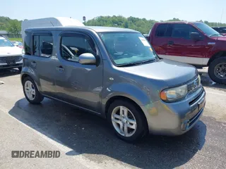2012 Nissan Cube S z VIN JN8AZ2KR6CT254949, wystawiony jako IAAI lot #42089053 z przebiegiem 147 097 mil mil oraz . Historia ofert i sprzedaży dostępna na DreamBid. Obrazek 1.