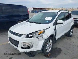 2015 Ford Escape SE with VIN 1FMCU0GX2FUB33893, listed as a IAAI auction lot 41455605 with 128,383 mi miles. Bid and sale history available at carsss.com. Image 2.