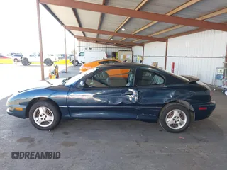 2005 Pontiac Sunfire z VIN 3G2JB12F45S170419, wystawiony jako IAAI lot #42304665 z przebiegiem 72 679 mil mil oraz . Historia ofert i sprzedaży dostępna na DreamBid. Obrazek 6.