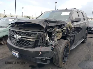 2018 Chevrolet Tahoe LT with VIN 1GNSCBKC5JR126474, listed as a IAAI auction lot 41896310 with 90,928 mi miles and . Bid and sale history available at DreamBid. Image 2.