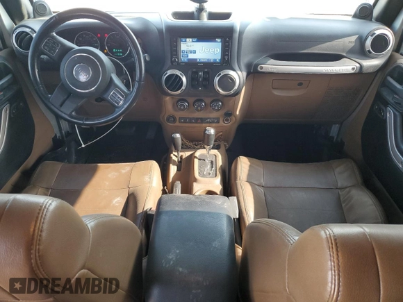 2012 Jeep Wrangler Unlimited Sahara z VIN 1C4HJWEG4CL159731, wystawiony jako Copart lot #59968695 z przebiegiem 111 918 mil mil oraz Szkoda całkowita • Salvage title. Historia ofert i sprzedaży dostępna na DreamBid. Obrazek 8.