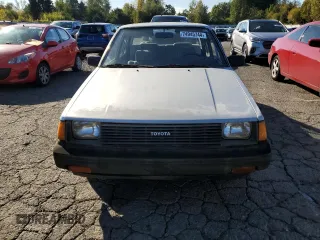 1984 Toyota Corolla с VIN JT2AE83E8E3091481, выставлен на аукционе Copart как лот 74945744 с пробегом 145 163 миль миль и Чистый • Clean title. История ставок и продаж доступна на DreamBid. Изображение 5.
