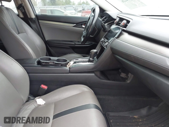 2017 Honda Civic EX-L with VIN 19XFC1F75HE200211, listed as a IAAI auction lot 41954126 with 105,637 mi miles and . Bid and sale history available at DreamBid. Image 5.