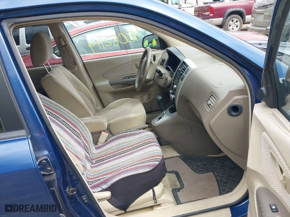 2006 Hyundai Tucson GLS with VIN KM8JN72D36U409525, listed as a IAAI auction lot 42082119 with 142,163 mi miles. Bid and sale history available at carsss.com. Image 5.