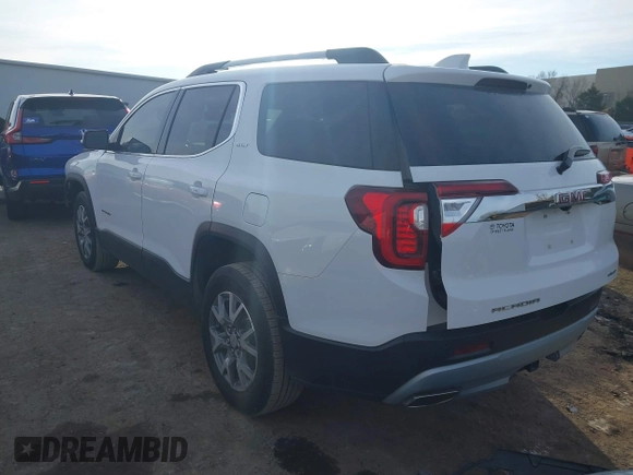2020 GMC Acadia SLT with VIN 1GKKNULS0LZ136051, listed as a IAAI auction lot 41236862 with 59,176 mi miles and . Bid and sale history available at DreamBid. Image 3.