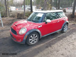 2009 MINI Cooper Hardtop S with VIN WMWMF735X9TT97788, listed as a IAAI auction lot 41925351 with 150,858 mi miles. Bid and sale history available at carsss.com. Image 17.
